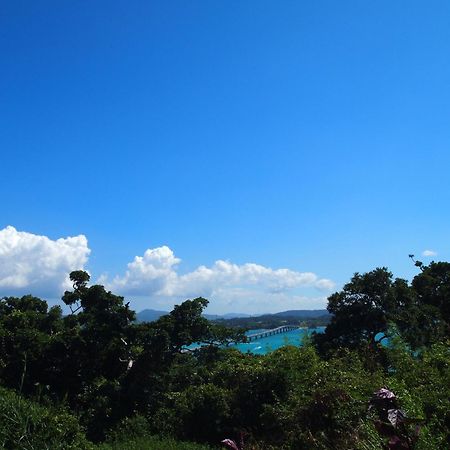 Ocean Hills Kouri Hotel Nakijin Bagian luar foto
