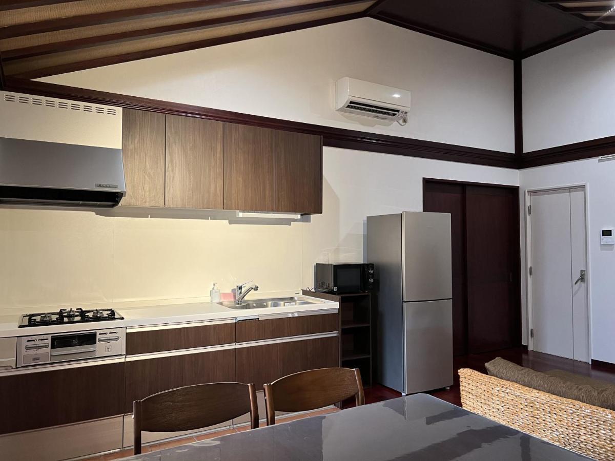 Ocean Hills Kouri Hotel Nakijin Bagian luar foto