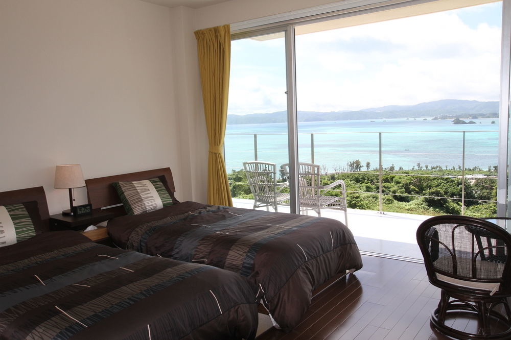 Ocean Hills Kouri Hotel Nakijin Bagian luar foto