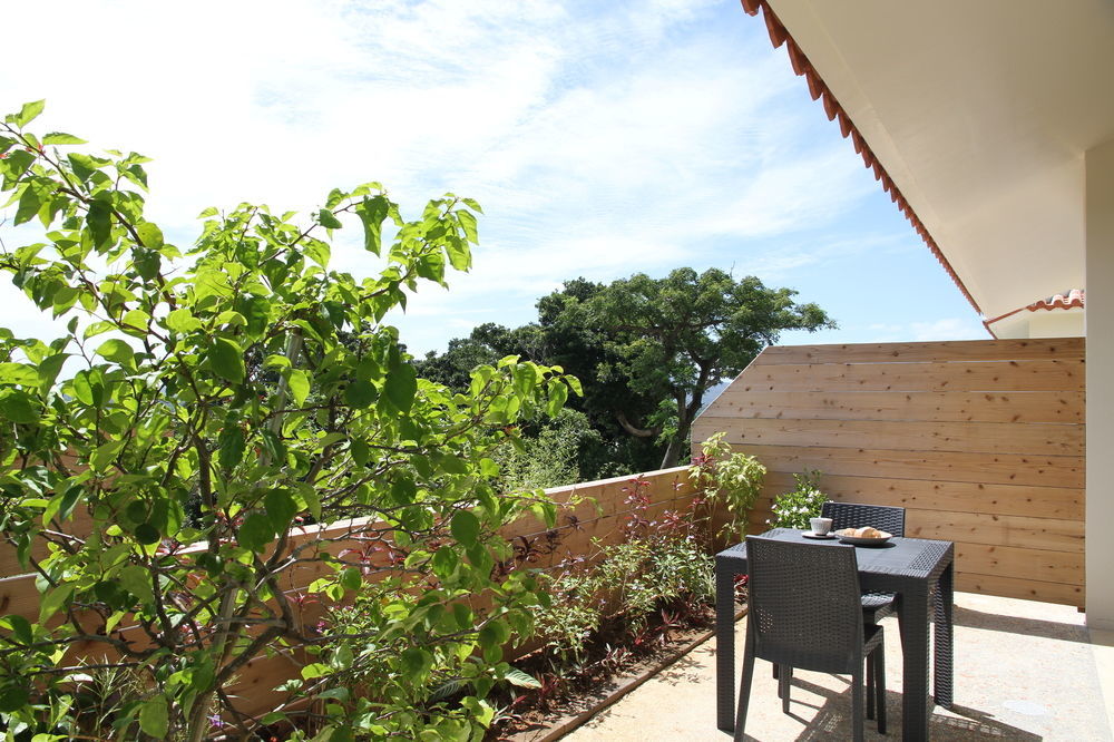 Ocean Hills Kouri Hotel Nakijin Bagian luar foto