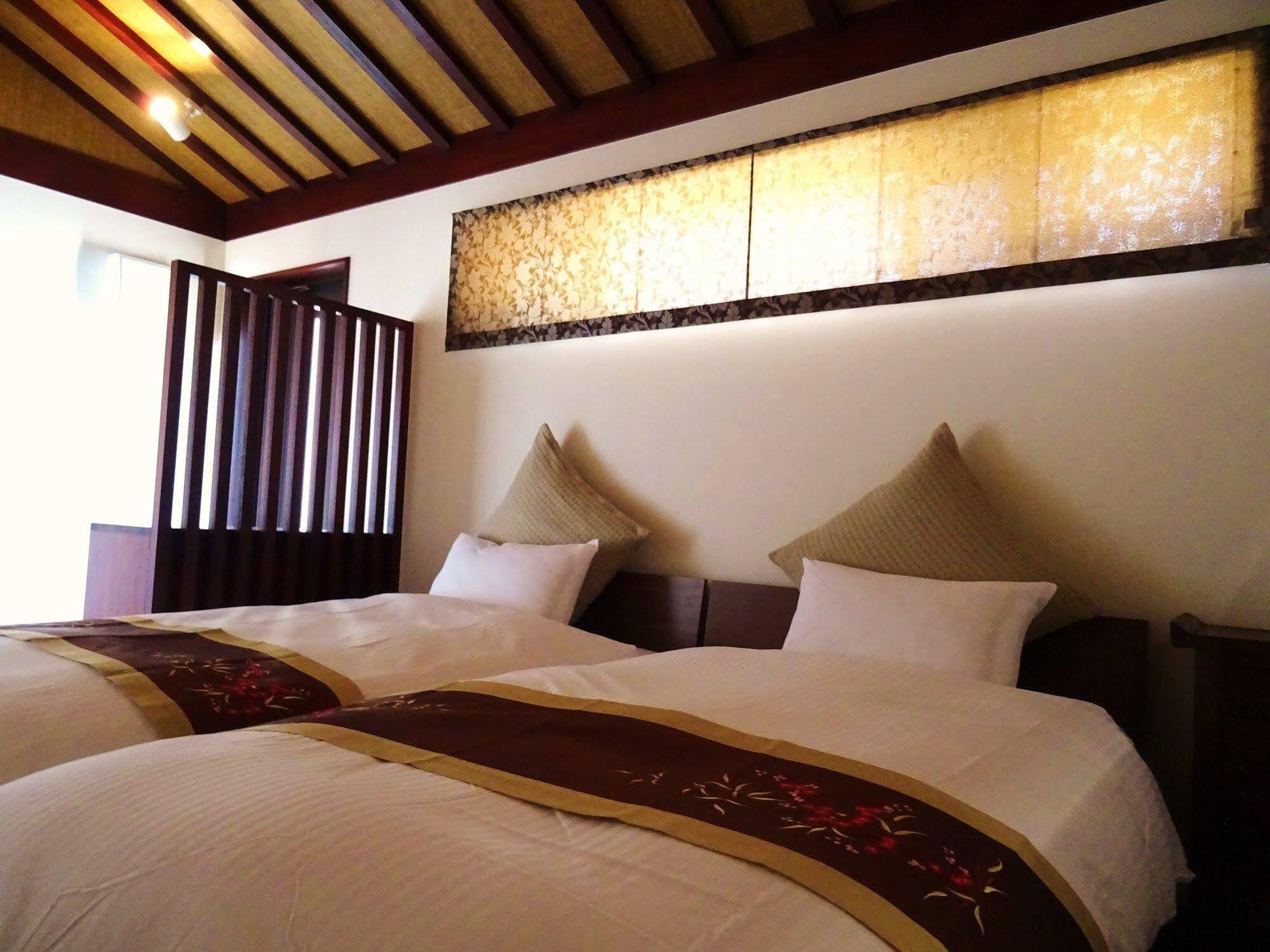 Ocean Hills Kouri Hotel Nakijin Bagian luar foto
