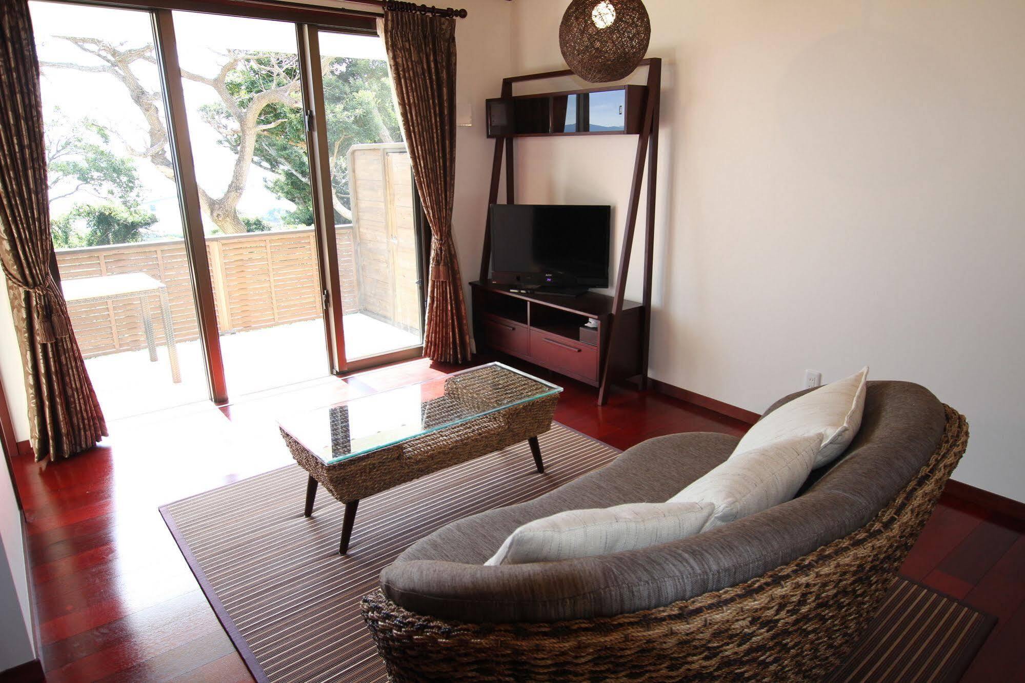 Ocean Hills Kouri Hotel Nakijin Bagian luar foto